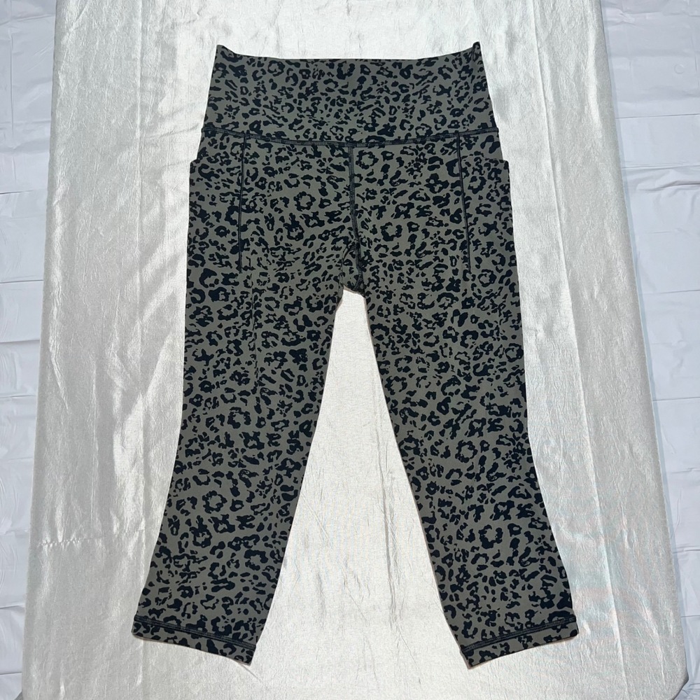 Athleta Salutation II Capri Leggings Olive Green Leopard Print Pockets Womens M